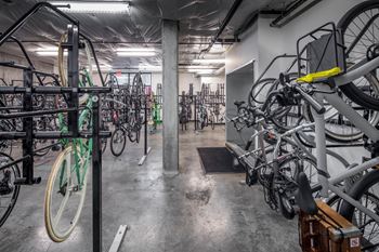 a large bike rack filled with bikes at The Parker Apartments, Portland, Oregon